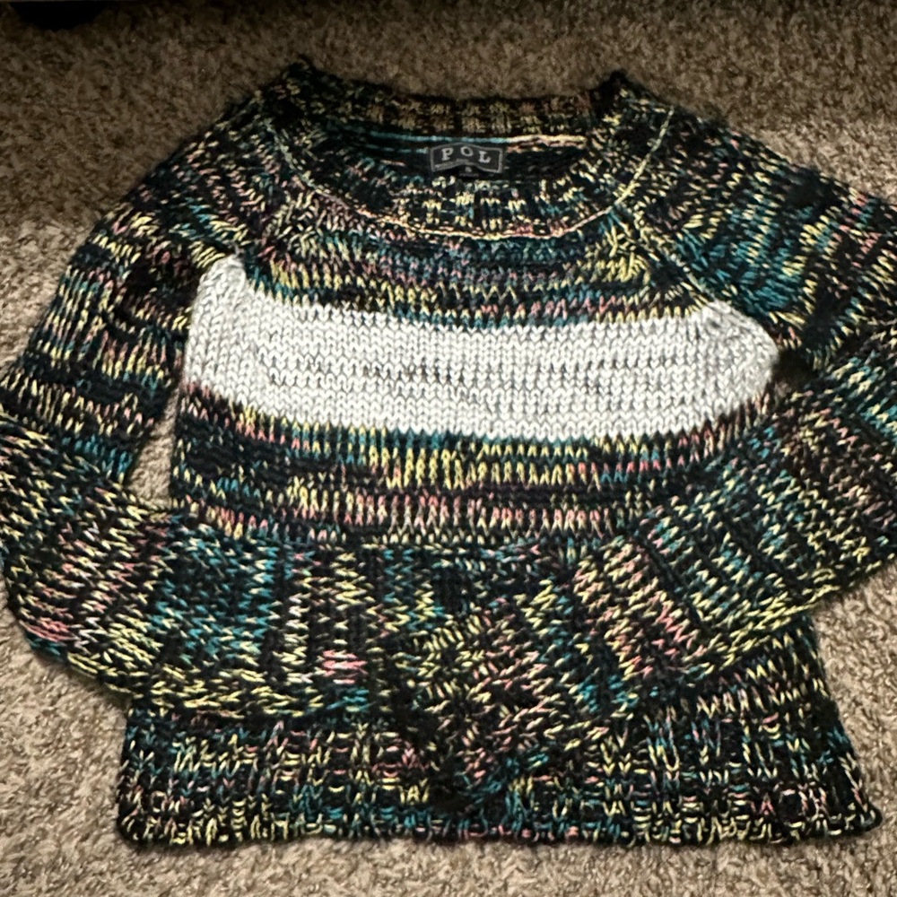 POL black knitted sweater with yellow, pink, and blue.